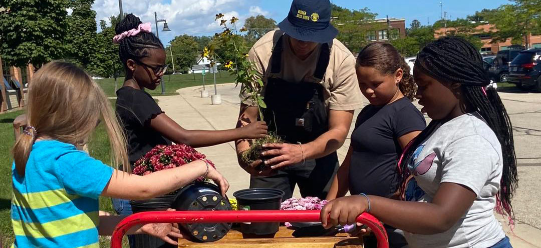 Brass got an upgrade last week as some of our 5th graders helped fill our new planters with flowers and plants donated by Hawthorn Hollow.