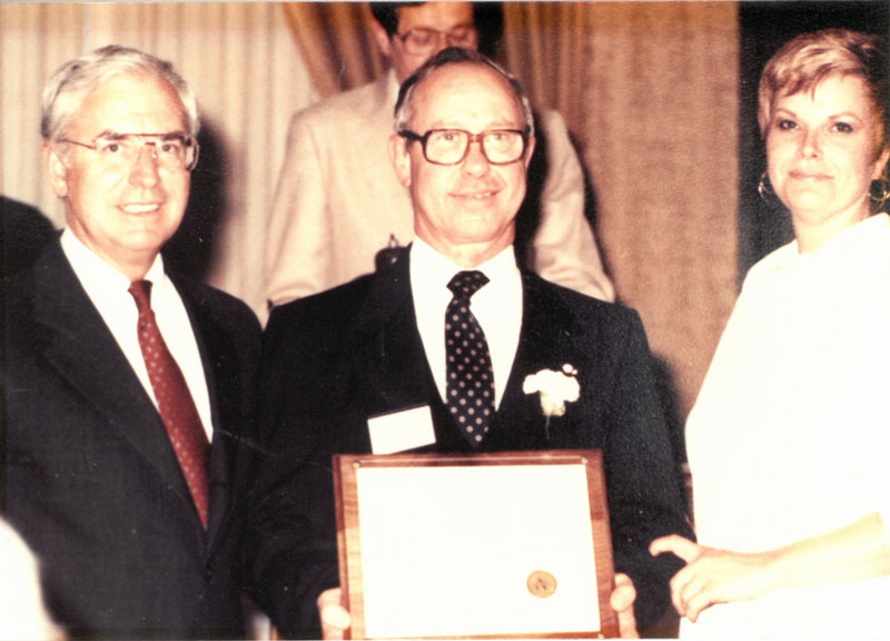 Francis Oberpriller with award presenters.