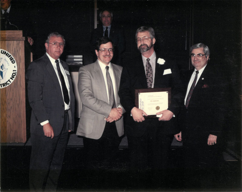 Allan Lindstrom with award presenters.