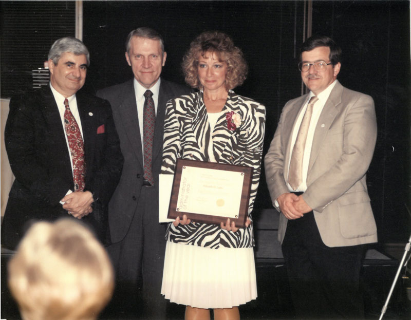 Elizabeth Sabo with award presenters.