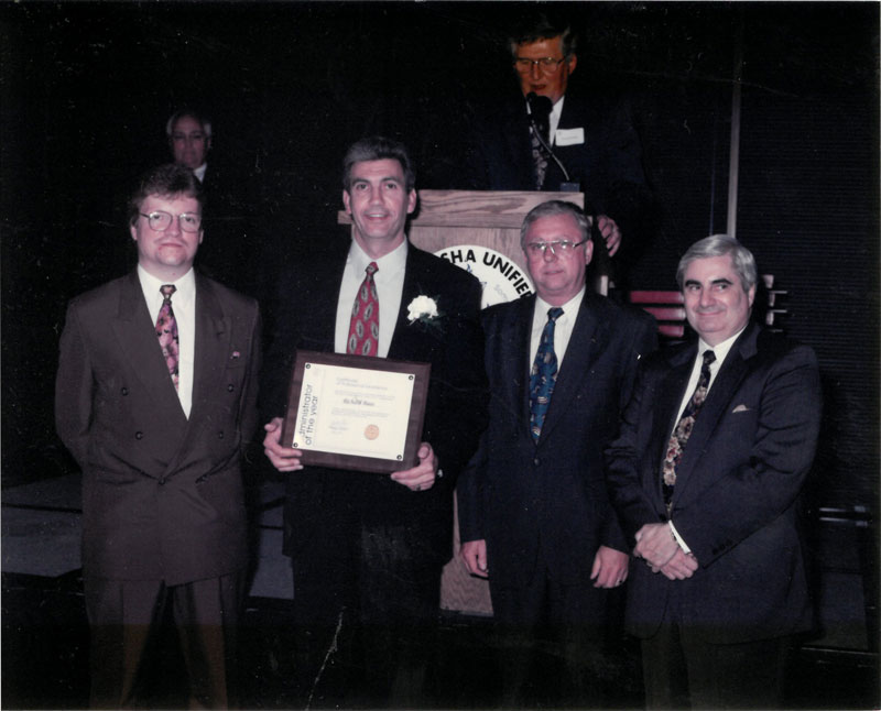 Richard Bass with award presenters.