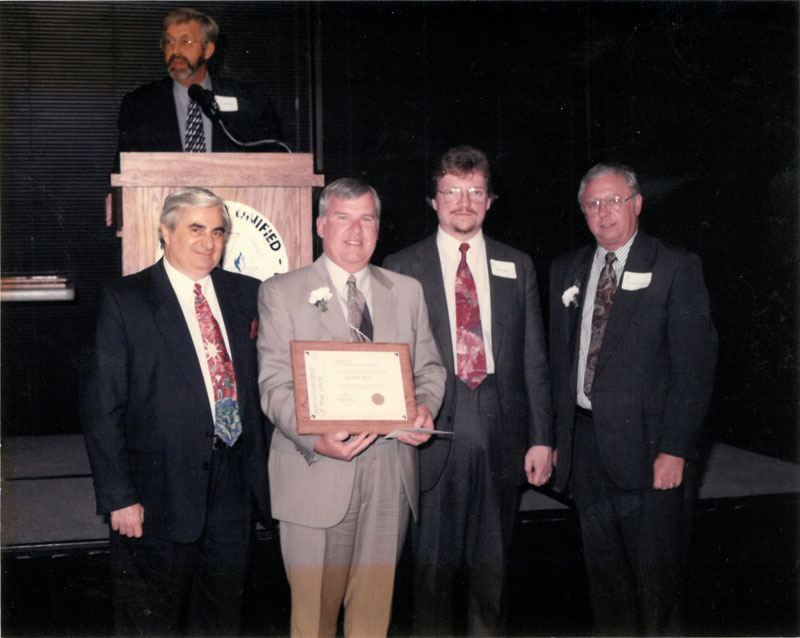 Gordon Hess with award presenters.