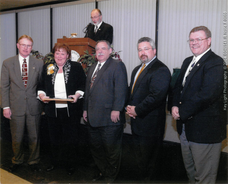 Debra Schaefer with award presenters.