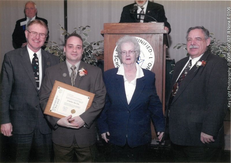 Jonathan Bar-Din with award presenters.