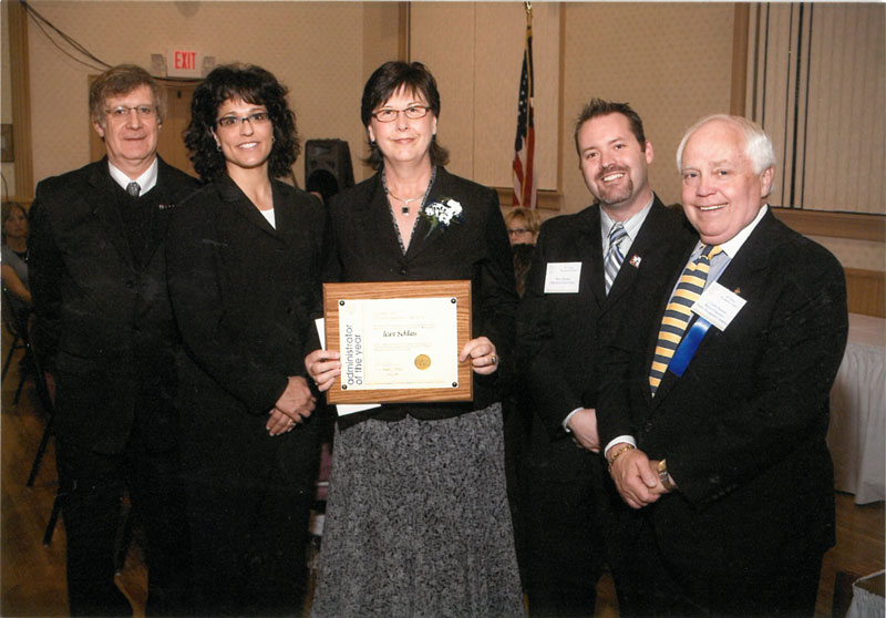 Jean Schlais with award presenters.