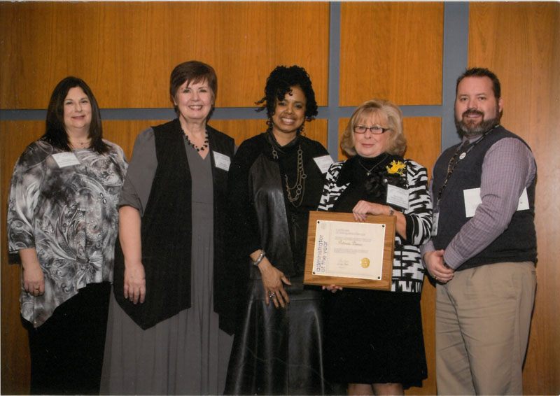 Patricia Demos with award presenters.