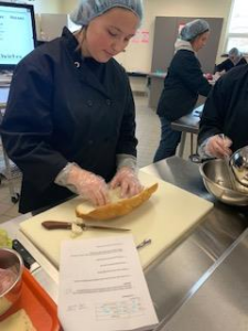 Tremper Culinary Student cooking up lunch for Reality Check