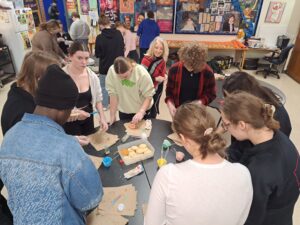 National Honor Society decorating cookies to donate to the Shalom Center