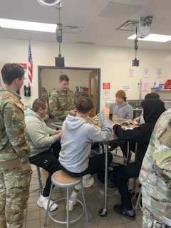 Army soldier talking with Culinary classes about the food they eat.