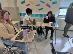 Math students using experimental design and technology 