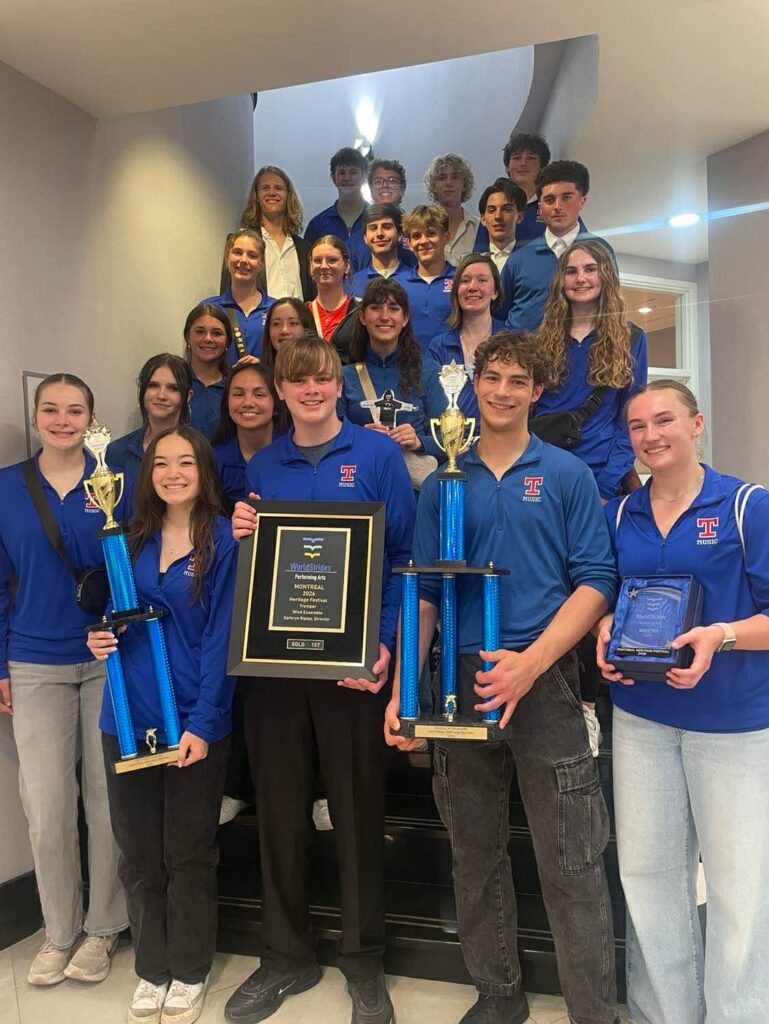 Tremper group band picture with trophies.