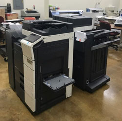 Two copy machines in the copy center.