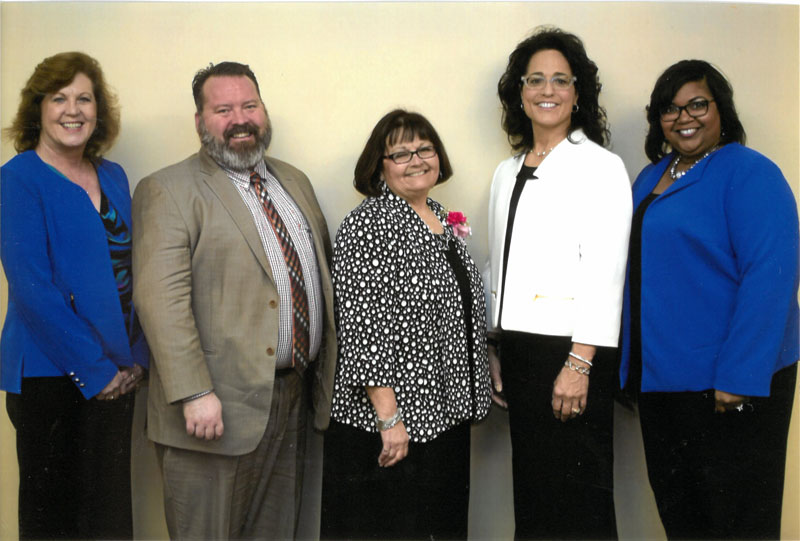 Jolene Schneider with award presenters.