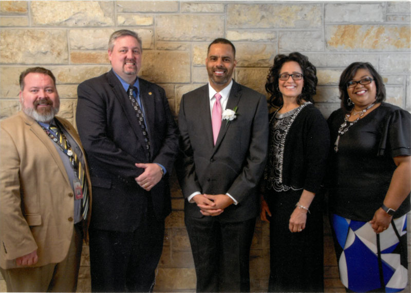 Shane Gayle with award presenters.