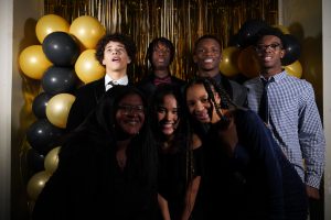 Seven AAYI students posing at the gala.