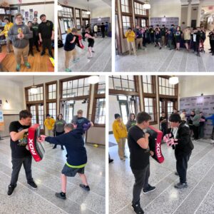 Reuther students lead martial arts session for Harborside 6th graders